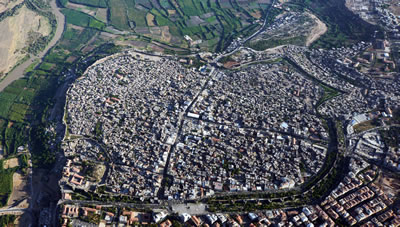 <p><strong>4.</strong> Diyarbakır Suriçi Çatışma Öncesi  Durum, Mart 2013<br />  Fotoğraf: Merthan Anık</p>